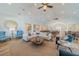 Expansive living area with a cozy seating arrangement and stylish decor, perfect for relaxation and socializing at 3587 Fishpond Cir, Dacula, GA 30019