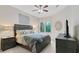Comfortable bedroom featuring a large bed, neutral color scheme, and ample natural light at 3621 Vinings Slope Se # 3411, Atlanta, GA 30339