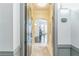 Inviting entryway with dark hardwood flooring, neutral walls and an arched doorway at 3621 Vinings Slope Se # 3411, Atlanta, GA 30339