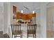Stylish kitchen with granite countertops, stainless steel appliances and breakfast bar seating at 3621 Vinings Slope Se # 3411, Atlanta, GA 30339