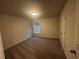 Neutral-toned bedroom with carpet and a window at 337 Willow Cv, Canton, GA 30114