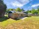 Well maintained backyard with a brick house and concrete patio at 211 Murphy Ave, Lawrenceville, GA 30044