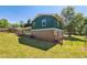 Expansive backyard featuring a lush green lawn and mature trees at 211 Murphy Ave, Lawrenceville, GA 30044