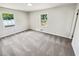 Bright bedroom with new carpet, natural light and neutral paint at 211 Murphy Ave, Lawrenceville, GA 30044