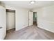 Spacious bedroom with closet, neutral walls, and access to additional rooms nearby at 211 Murphy Ave, Lawrenceville, GA 30044