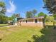 Charming brick and siding home with a well-kept lawn and driveway at 211 Murphy Ave, Lawrenceville, GA 30044