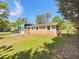 Brick and siding home with a spacious front yard and two-car garage at 211 Murphy Ave, Lawrenceville, GA 30044