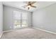 Bedroom with ceiling fan and grey carpet at 1055 Leighs Brook Way, Dacula, GA 30019