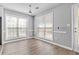 Breakfast nook with hardwood floors and two windows at 1055 Leighs Brook Way, Dacula, GA 30019