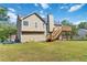 Two story house with backyard and deck at 1055 Leighs Brook Way, Dacula, GA 30019