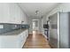 Kitchen with granite countertops and stainless steel appliances at 1055 Leighs Brook Way, Dacula, GA 30019