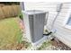 Side view of a residential AC unit on a gravel bed at 3406 Ravensworth Nw Trce, Kennesaw, GA 30144