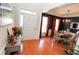 Entryway leading to dining area with dark walls, chandelier and a light entry door at 3406 Ravensworth Nw Trce, Kennesaw, GA 30144