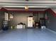 Organized garage with painted walls and ample storage space at 3406 Ravensworth Nw Trce, Kennesaw, GA 30144
