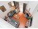 Overhead view of the living room showing the hardwood flooring and the placement of the fireplace at 3406 Ravensworth Nw Trce, Kennesaw, GA 30144