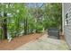 Backyard features patio and surrounding greenery at 4001 Avalon Sw Rd, Atlanta, GA 30331