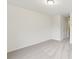 Neutral-toned bedroom with plush carpeting and ample space at 4001 Avalon Sw Rd, Atlanta, GA 30331
