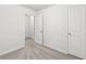 Bedroom with neutral carpet, closet and white doors at 4001 Avalon Sw Rd, Atlanta, GA 30331