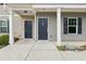 A townhouse entrance with two front doors, showcasing a clean and modern facade at 4001 Avalon Sw Rd, Atlanta, GA 30331