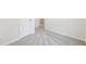 Hallway with neutral carpet, white trim, and access to other rooms at 4001 Avalon Sw Rd, Atlanta, GA 30331