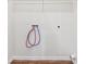 Bright laundry room features white walls, and wood floor at 4001 Avalon Sw Rd, Atlanta, GA 30331