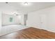 Open living area features neutral carpet, window and entry to home at 4001 Avalon Sw Rd, Atlanta, GA 30331