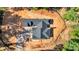 Aerial perspective highlighting roofline and location among mature trees at 107 Marks Way, Canton, GA 30115