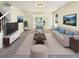 Bright living room features neutral decor, plush carpeting, and comfortable furnishings for a welcoming ambiance at 6260 Selborn Sw Dr, Atlanta, GA 30331