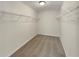 Walk-in closet with carpet floors and wire shelving at 6260 Selborn Sw Dr, Atlanta, GA 30331