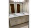 Bathroom featuring a double sink vanity and a large mirror, providing ample space and functionality at 3370 Knighton Rdg, Powder Springs, GA 30127