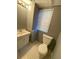 Compact bathroom featuring tile flooring, vanity and toilet at 3370 Knighton Rdg, Powder Springs, GA 30127
