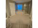 Bathroom featuring a separate glass shower and a large tub at 3370 Knighton Rdg, Powder Springs, GA 30127