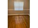 Bedroom with hard wood floors, neutral paint, and good natural light at 3370 Knighton Rdg, Powder Springs, GA 30127