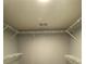 Walk-in closet with white wire shelving at 3370 Knighton Rdg, Powder Springs, GA 30127