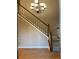 Grand entryway with hardwood floors, chandelier and staircase leading upstairs at 3370 Knighton Rdg, Powder Springs, GA 30127