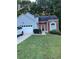 Charming single Gathering home featuring a two-car garage and nicely maintained lawn at 3370 Knighton Rdg, Powder Springs, GA 30127