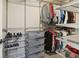 Large walk-in closet with ample shelving and drawers at 27303 Plantation Ne Dr, Atlanta, GA 30324