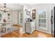 Bright dining area with hardwood floors and built-in cabinetry at 27303 Plantation Ne Dr, Atlanta, GA 30324