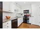 Kitchen features granite countertops and white shaker cabinets at 27303 Plantation Ne Dr, Atlanta, GA 30324