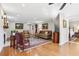 Open living area with hardwood floors and view into bedroom at 27303 Plantation Ne Dr, Atlanta, GA 30324