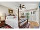 Main bedroom with hardwood floors and a large window at 27303 Plantation Ne Dr, Atlanta, GA 30324