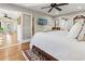 Main bedroom with hardwood floors, and access to sunroom at 27303 Plantation Ne Dr, Atlanta, GA 30324