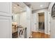 Bright vanity area with built in storage and hardwood floors at 27303 Plantation Ne Dr, Atlanta, GA 30324