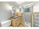 Modern bathroom with walk-in shower and glass block feature at 4599 Park Dr, Pine Lake, GA 30083