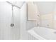 Shower and bathtub combination with tiled walls at 4599 Park Dr, Pine Lake, GA 30083