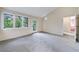 Bright bedroom featuring a door leading to a deck at 4599 Park Dr, Pine Lake, GA 30083