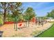 Community playground with swings and play structures at 4599 Park Dr, Pine Lake, GA 30083