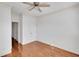 Bright bedroom with wood floors, ceiling fan and recessed lighting at 4853 Stonehall Pl, Atlanta, GA 30339