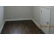 Bedroom with hardwood flooring, neutral paint, crown molding, and natural light at 354 Mansfield Way, Stockbridge, GA 30281