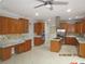 Spacious kitchen featuring stainless steel appliances, granite countertops, and a central island at 354 Mansfield Way, Stockbridge, GA 30281